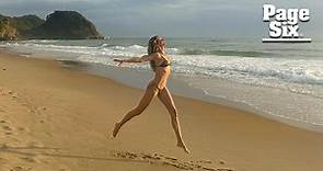 Gisele Bündchen frolics on Brazil beach in tiny string bikini