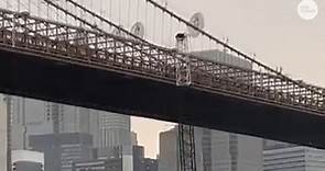 Brooklyn Bridge damaged after large crane on passing barge collides with its side