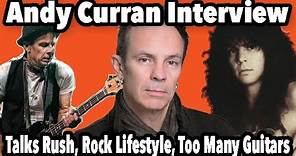 Andy Curran Talks Rush, Rock Lifestyle, Too Many Guitars & Surviving The Job
