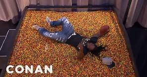 Marshawn Lynch Dives Into An End Zone Of Skittles | CONAN on TBS