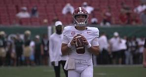Tyler Buchner warms up for his first start as Alabama's quarterback