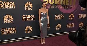 Kristen Wiig attends the Carol Burnett ceremony in silver dress