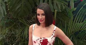 Lea Michele poses in elegant floral gown at 2023 Tony Awards
