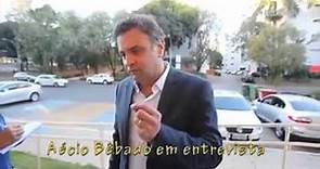 Candidato Aécio Neves dando entrevista bêbado