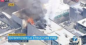 Firefighters battling large structure fire in downtown Los Angeles
