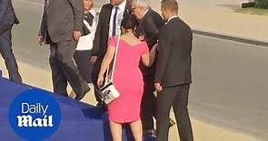 Jean-Claude Juncker stumbles and is helped by leaders at NATO gala