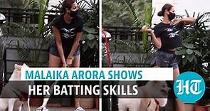 Watch: Actor Malaika Arora plays cricket with son Arhaan