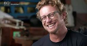 Simon Baker jokes he's a 'w**ker' during his 60 Minutes interview