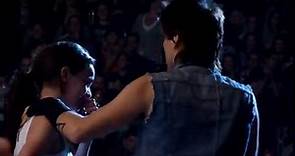 Jared Leto hugging and kissing an Echelon girl on stage