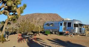 The B-52s' Kate Pierson Has A Colorful Vintage Airstream Hotel In The Desert