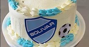 tutorial to decorate cake with bolivar topper