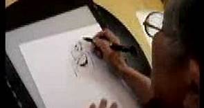 Iwao Takamoto drawing Fred Flintstone