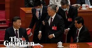 Former Chinese president Hu Jintao unexpectedly led out of party congress