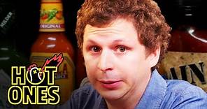 Michael Cera Experiences Mouth Pains While Eating Spicy Wings | Hot Ones