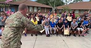 Military homecoming: Dad surprises Spruce Creek student at school