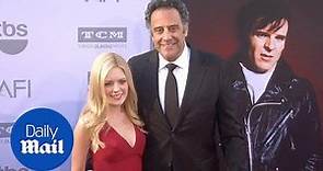Brad Garrett and IsaBeall Quella arrive on red carpet in April - Daily Mail