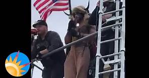 Court releases video of Jake Angeli, who mobbed U.S. Capitol in fur hat and horns