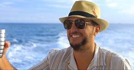 Luke Bryan Throws a Beach Party in 'One Margarita' Video