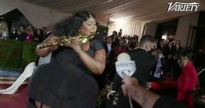 Lizzo Plays The Flute On the Met Gala Steps