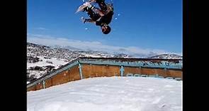 Australian Snowboarder Beau Fisher Frontside rodeo to switch fifty fifty on rail at Perisher Resort