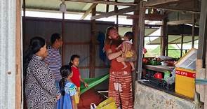 Three orphaned sisters in rural Cambodia, organized by Andrew Novell