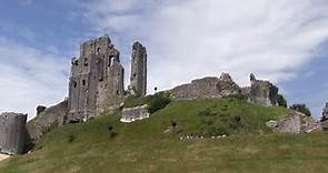 Corfe Castle And Village On The Isle Of Purbeck In Dorset.