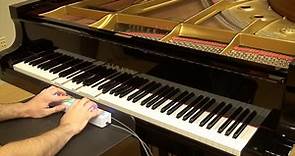 Piano Genie: An Intelligent Musical Interface