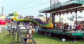 AJ riding Dragon Wagon at the Fair