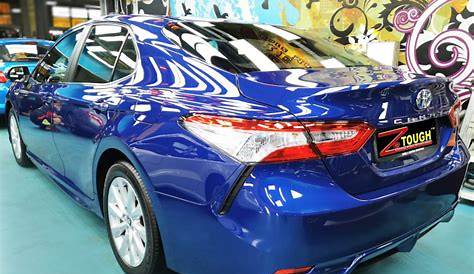 A Captivating Toyota Camry Hybrid Went in for Titanium Paint Protection