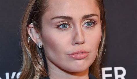 Miley Cyrus Celebrates 'Flowers' Historical Chart Climb In Pink And