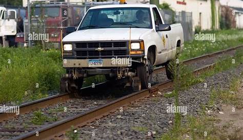 Truck with Train Track Tires that can drive along tracks to help with