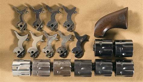 Colt Single Action Revolver Parts Including Cylinders, Hammers a | Rock