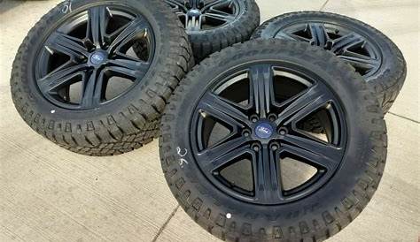 20" Ford F-150 OEM Black Wheels and Goodyear Wrangler Duratrac A/T