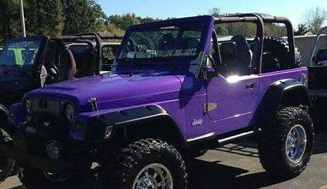 purple 4 door jeep wrangler