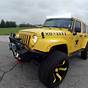 Lifted Yellow Jeep Wrangler