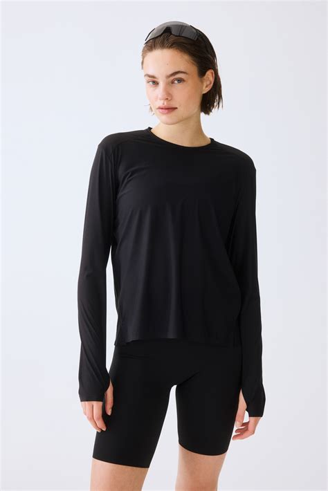 Women's Black Sports top with DryMove™ | H&M IN
