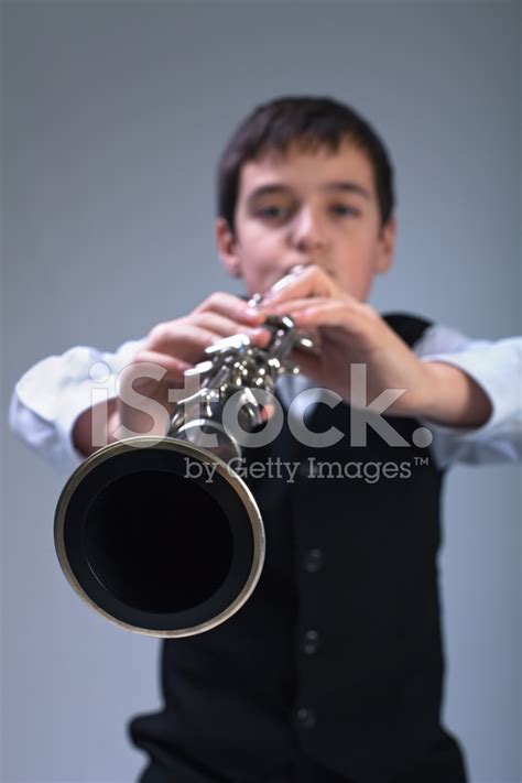 Boy Playing On The Clarinet Stock Photo Royalty Free Freeimages