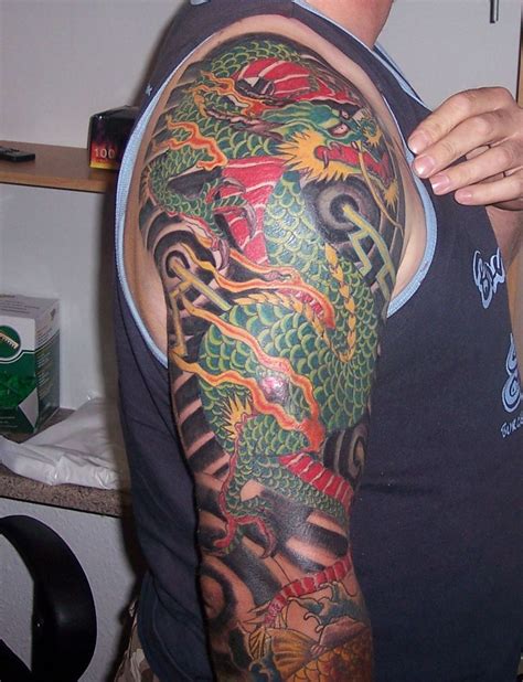 Full Arm Tattoo | Colourful full arm piece. | Classic Ink Tattoo Studio