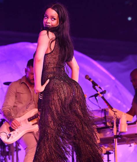Rihanna Flaunts Her Bum In Black Tasseled Catsuit On Anti World Tour In