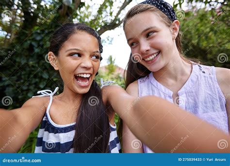 Youre Awesome No Youre Awesome Two Young Girl Friends Taking A Selfie Together Outside