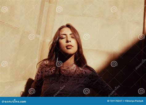 Sensual Brunette Model With Closed Eyes Posing At The Courtyard Stock Image Image Of City