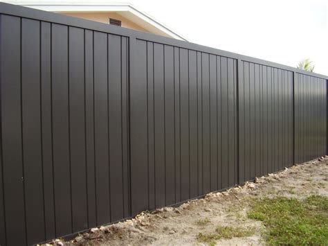 Corrugated panel is running horizontally. aluminum privacy fencing - Google Search | Metal fence ...