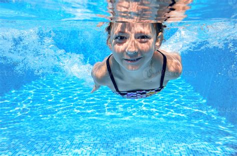 Happy Active Underwater Child Swims In Pool 788226 Stock Photo At Vecteezy