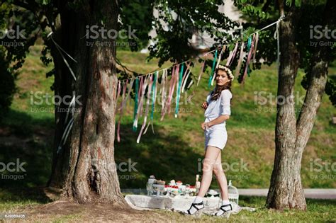 Unmarried Girl With Veil On Had Posed Background Picnic Table And Decor