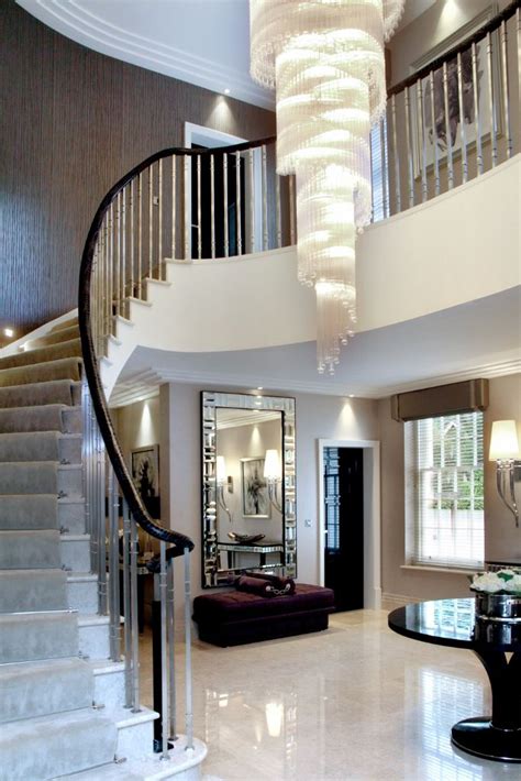 A Glass Chandelier Provides The Focal Point For The Entrance Hallway