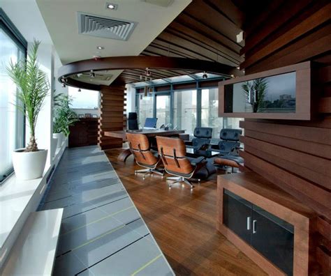 We have handled hundreds of interior flooring projects, from acid staining to overlays. Modern Workplace Environment by Art New Vision - InteriorZine