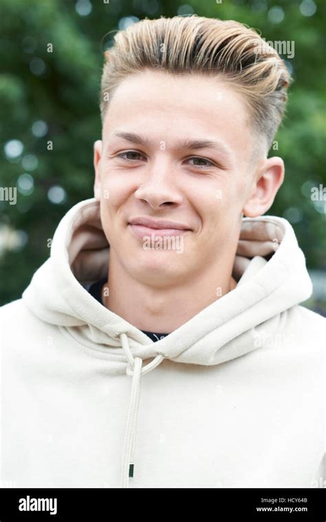 Head And Shoulders Portrait Of Smiling Teenage Boy Stock Photo Alamy