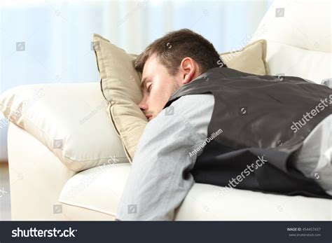 Tired Businessman Sleeping Lying On Couch Stock Photo 454457437
