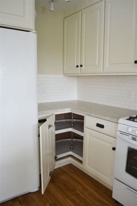 On our cabinets the base is separate and can be swapped out for store bought leg levelers. 36" Corner Base Pie Cut Kitchen Cabinet - Momplex White Kitchen | Ana White