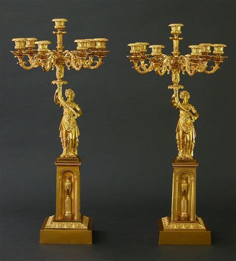 A Pair Of Classical Candelabra Charles Clark